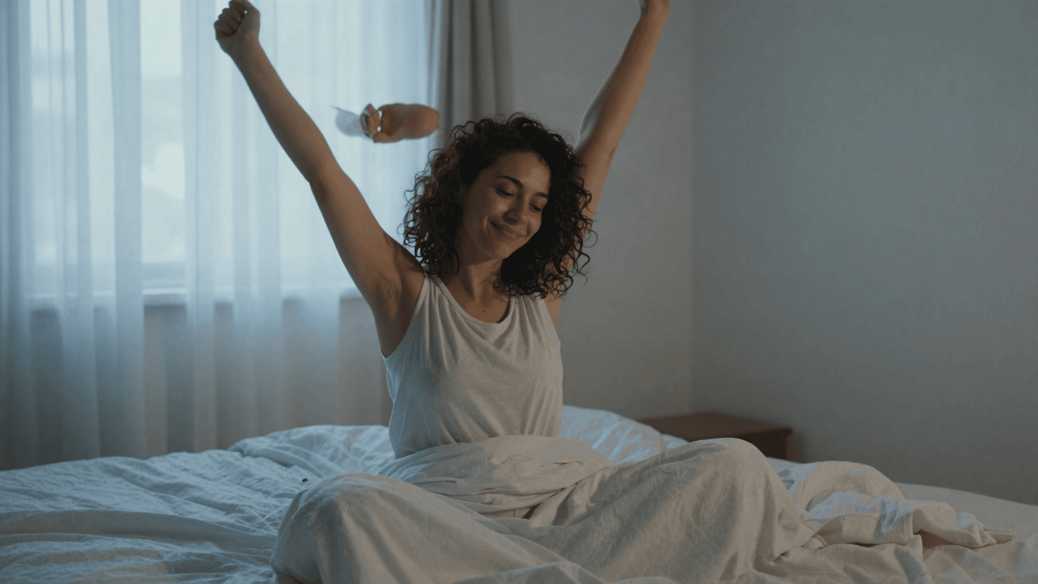 Waking and stretching in early morning light